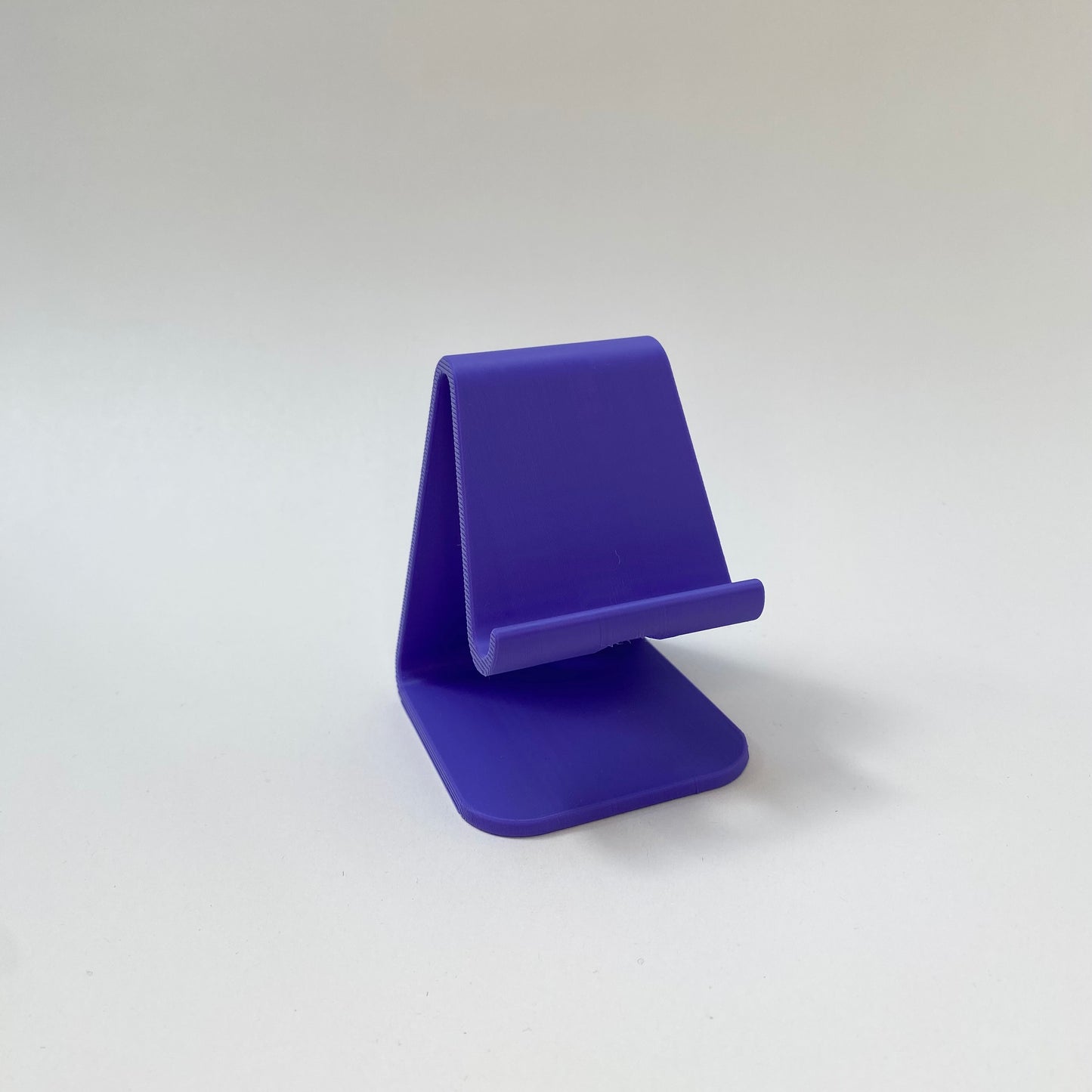 Minimalistlik mobiiltelefoni hoidja